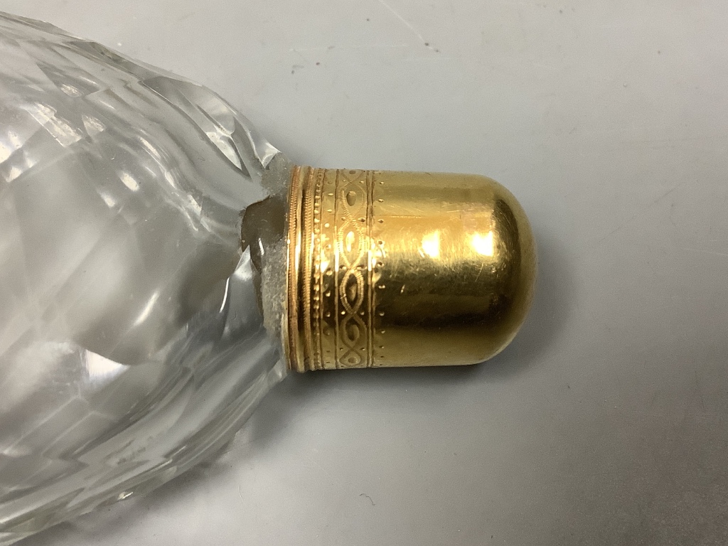 A late 18th/19th century yellow metal topped scent bottle